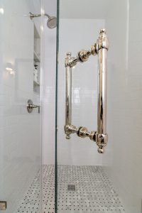 walk-in glass shower brass hardware