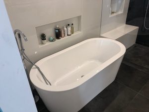 built in shelves over the tub