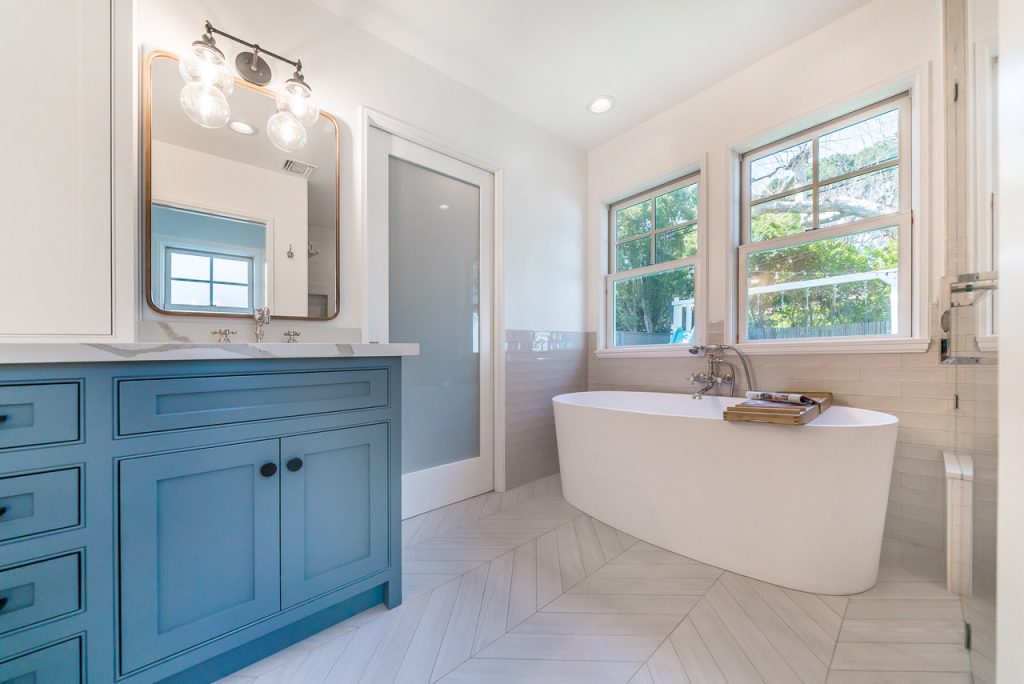 new bathroom with door to closet